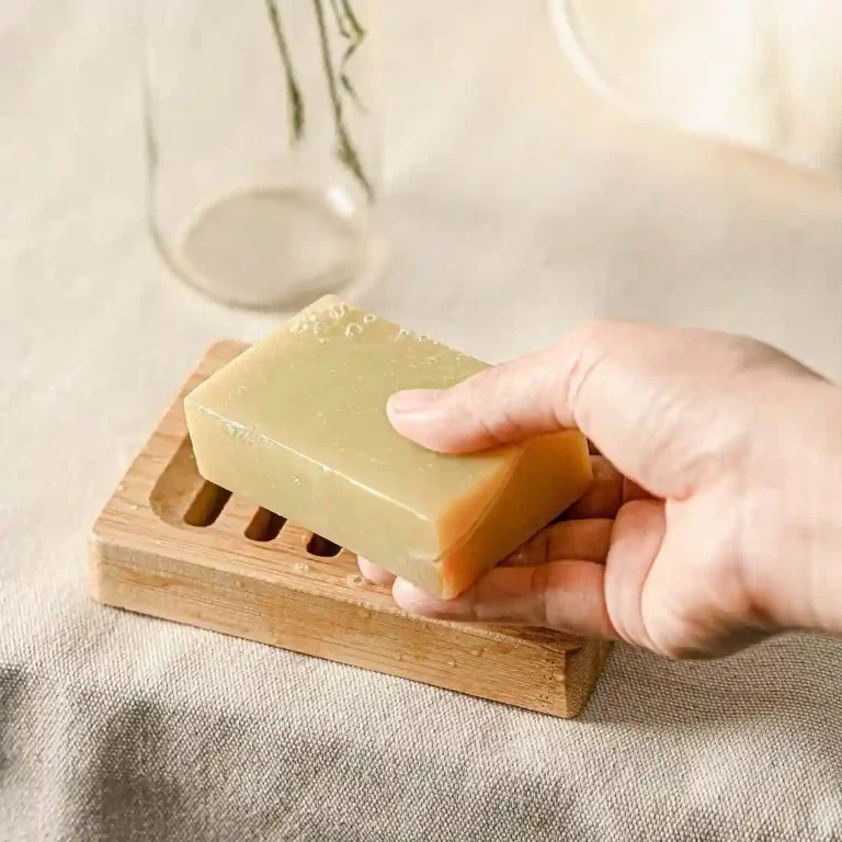 Wooden soap dish with drainage grooves keeps handmade soap dry